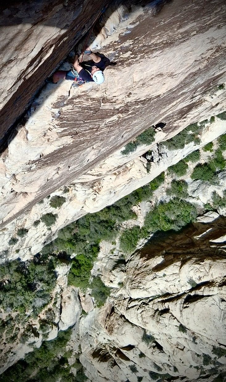 Michael Bos climbing red sandstone in Red Rock Canyon, Nevada